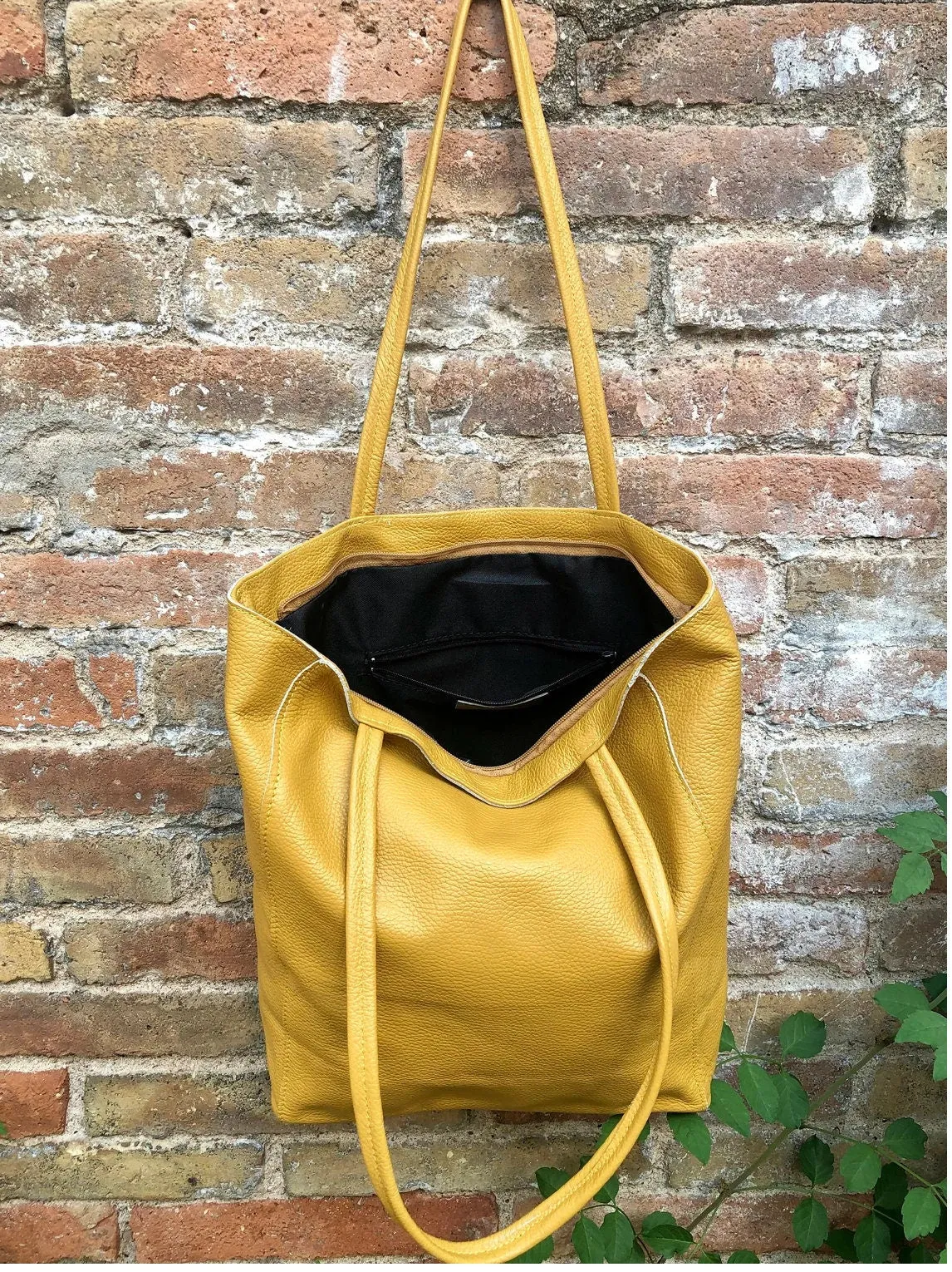 NEW with zipper and lining. Tote leather bag in BLACK . Soft GENUINE  leather bag. Large black bag .Laptop or book bag. Black  tote