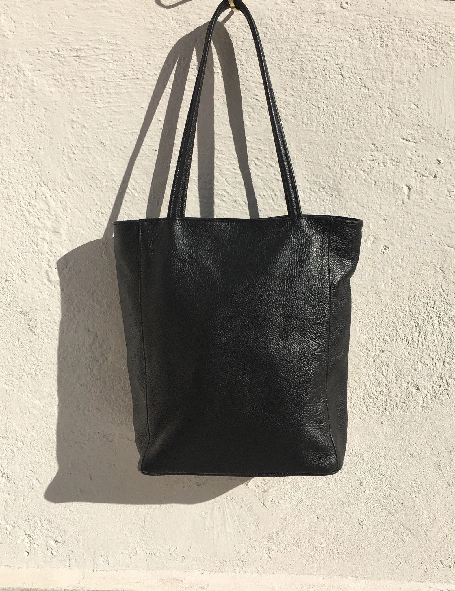 NEW with zipper and lining. Tote leather bag in BLACK . Soft GENUINE  leather bag. Large black bag .Laptop or book bag. Black  tote