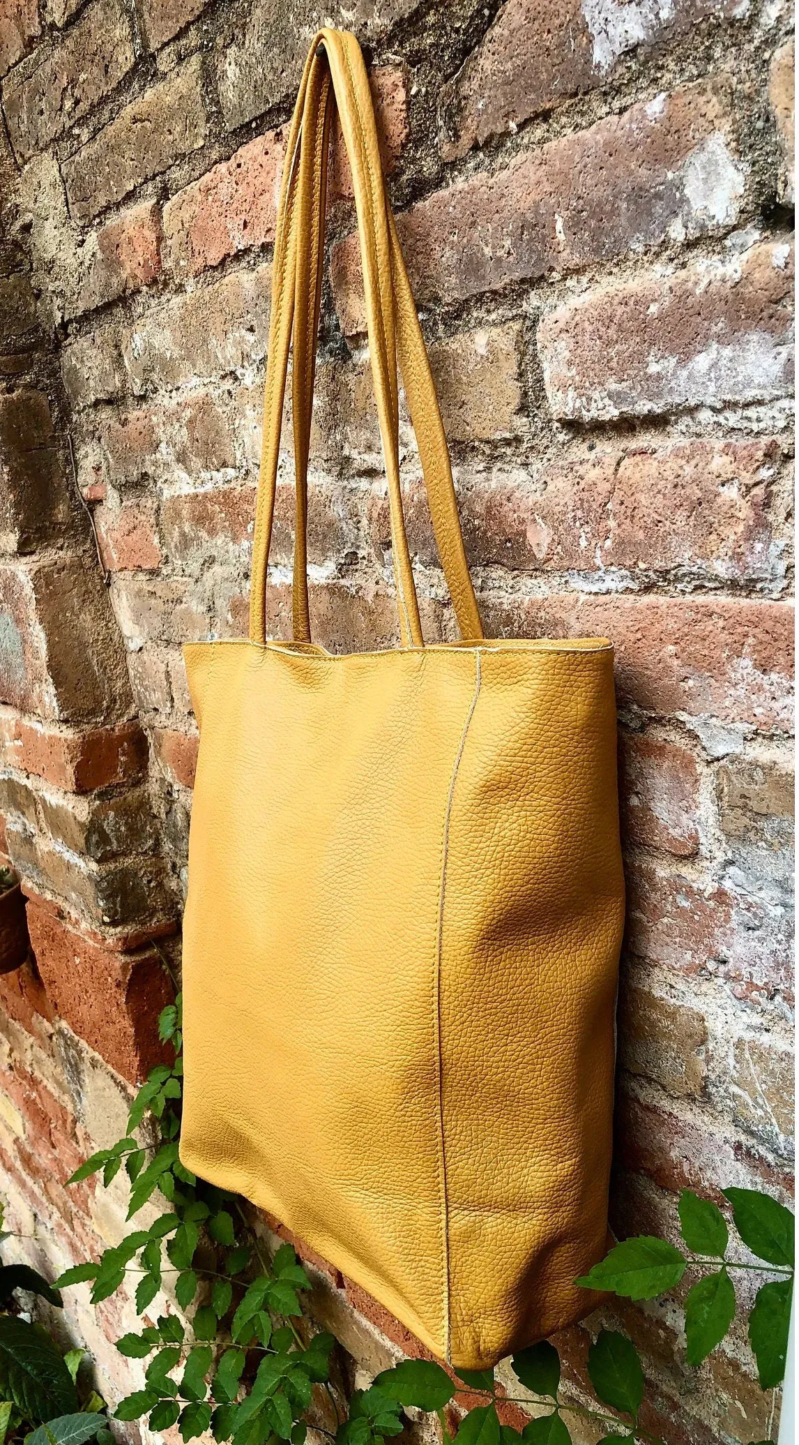 NEW with zipper and lining. Tote leather bag in BLACK . Soft GENUINE  leather bag. Large black bag .Laptop or book bag. Black  tote