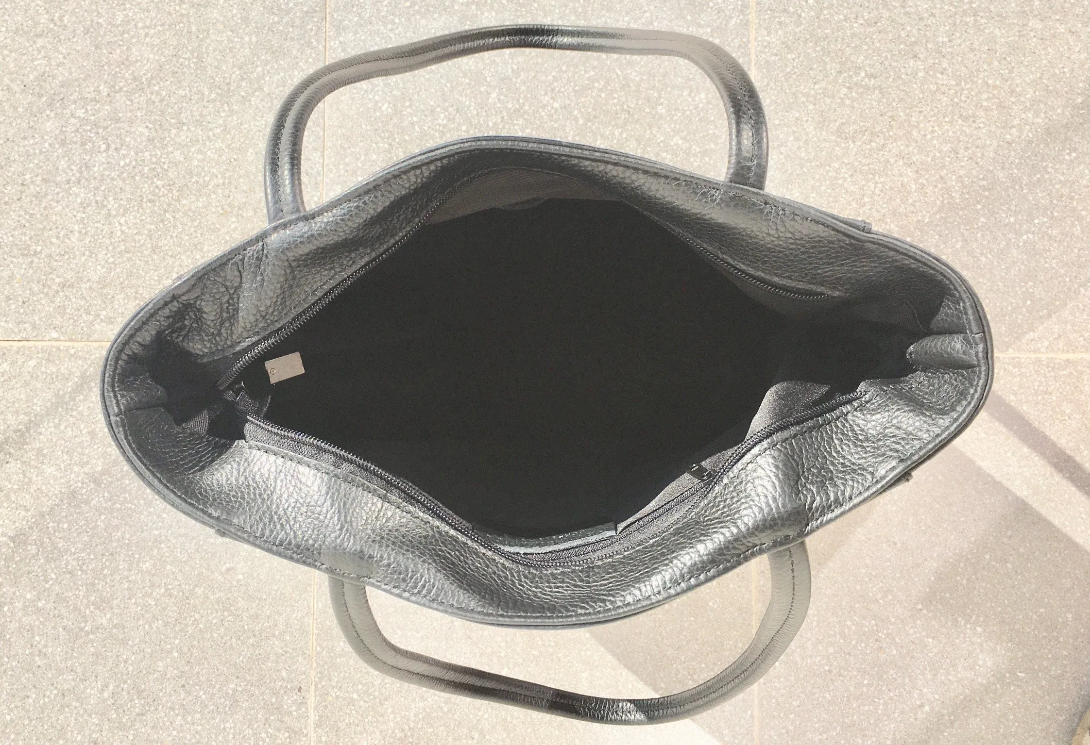 NEW with zipper and lining. Tote leather bag in BLACK . Soft GENUINE  leather bag. Large black bag .Laptop or book bag. Black  tote